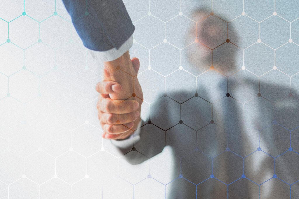 Corporate business handshake between partners